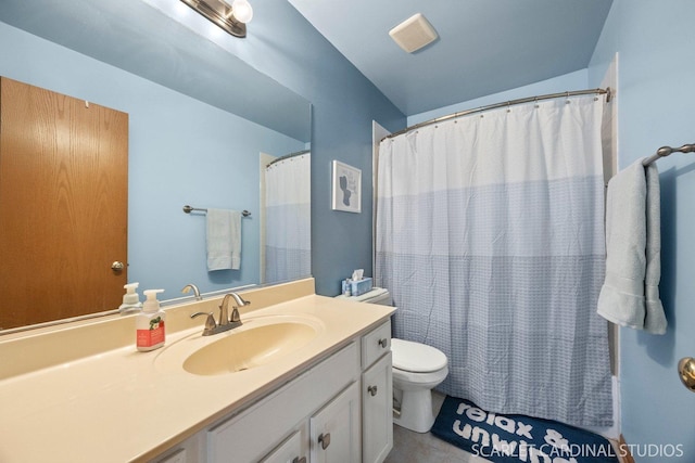 485 Mayfield Ln, Aurora, IL 60504 - bathroom featuring toilet, vanity, tile patterned flooring, and curtained shower