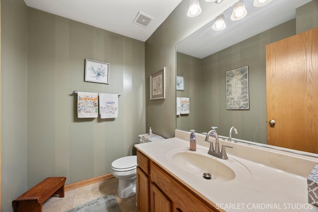 485 Mayfield Ln, Aurora, IL 60504 - bathroom with toilet, vanity, tile patterned floors, and baseboards