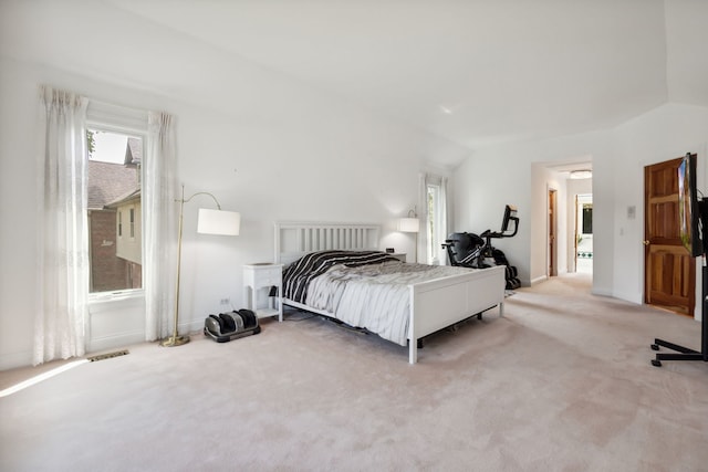 carpeted bedroom featuring baseboards