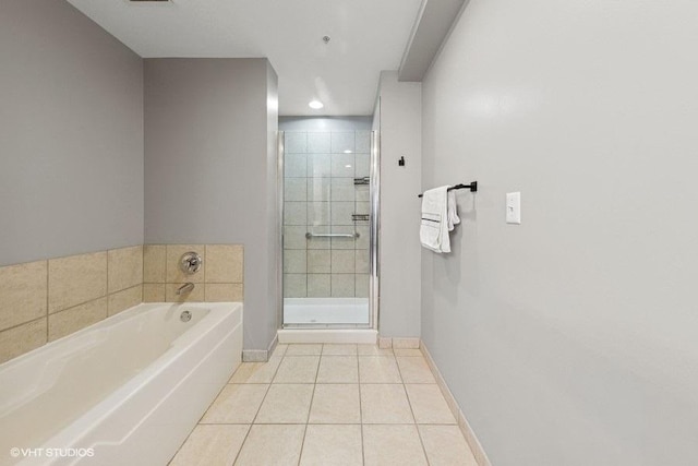 1717 S Prairie Ave Unit 1902, Chicago, IL 60616 - full bath featuring tile patterned floors, a garden tub, a stall shower, and baseboards
