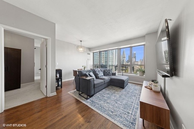 1717 S Prairie Ave Unit 1902, Chicago, IL 60616 - living room featuring wood finished floors, a chandelier, and baseboards