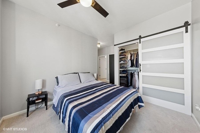 1717 S Prairie Ave Unit 1902, Chicago, IL 60616 - carpeted bedroom with a barn door, a closet, ceiling fan, and baseboards