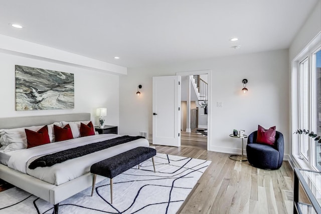 2128 Scotch Pine Ln, Northbrook, IL 60062 - bedroom with light wood-style flooring, recessed lighting, and baseboards