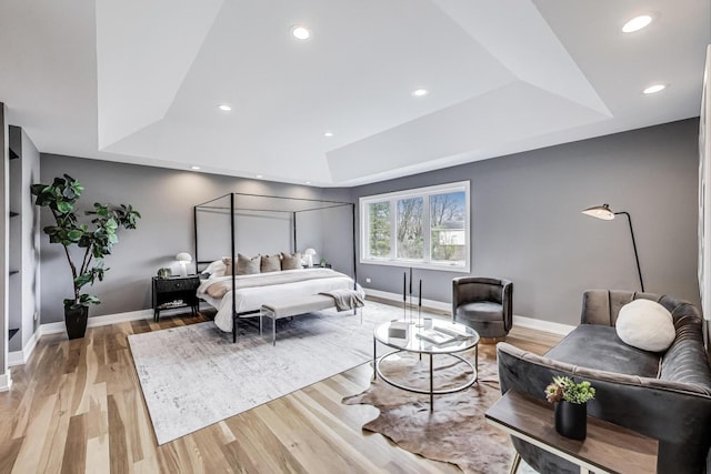 2128 Scotch Pine Ln, Northbrook, IL 60062 - bedroom with a raised ceiling, baseboards, light wood-type flooring, and recessed lighting
