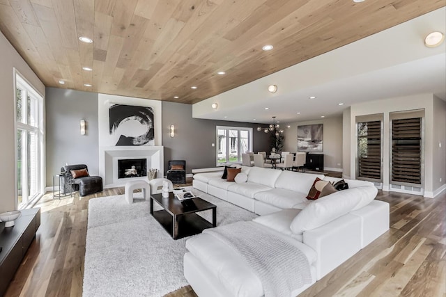 2128 Scotch Pine Ln, Northbrook, IL 60062 - living area with wooden ceiling, recessed lighting, wood finished floors, and a fireplace