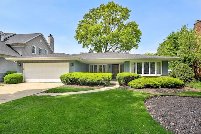 1405 N W St, Naperville, IL 60563 - view of front of house with a garage, a front yard, a chimney, driveway, and board and batten siding