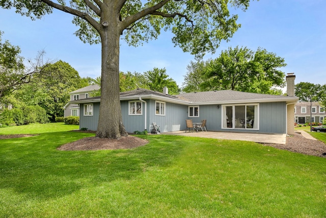 1405 N W St, Naperville, IL 60563 - back of house featuring a chimney, a patio, and a yard