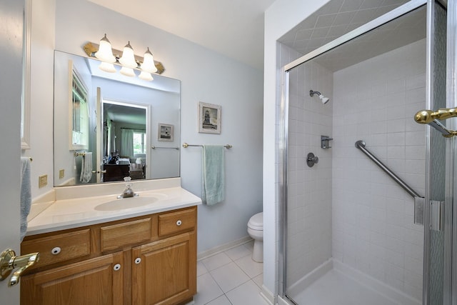 1405 N W St, Naperville, IL 60563 - bathroom with vanity, a shower stall, tile patterned flooring, and toilet