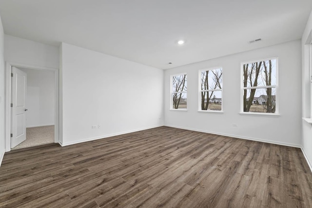 2601 Harnish Dr, Algonquin, IL 60102 - spare room with dark wood-style floors, healthy amount of natural light, recessed lighting, and baseboards