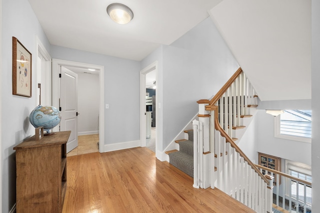 4617 Linscott Ave, Downers Grove, IL 60515 - foyer entrance with light wood-type flooring and stairs