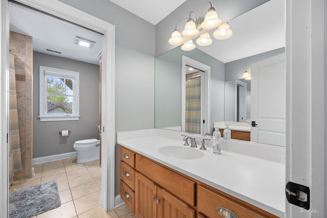 4617 Linscott Ave, Downers Grove, IL 60515 - bathroom with vanity, a chandelier, and tile patterned floors