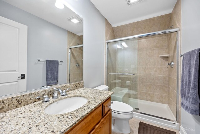 4617 Linscott Ave, Downers Grove, IL 60515 - bathroom featuring vanity, a stall shower, and tile patterned flooring