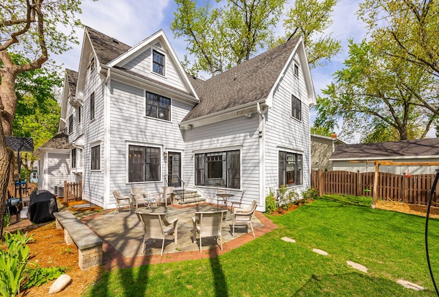 4617 Linscott Ave, Downers Grove, IL 60515 - rear view of house featuring a patio area, a shingled roof, and entry steps