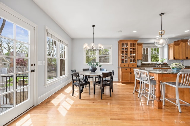 4617 Linscott Ave, Downers Grove, IL 60515 - dining area featuring a chandelier, light wood-style floors, and recessed lighting
