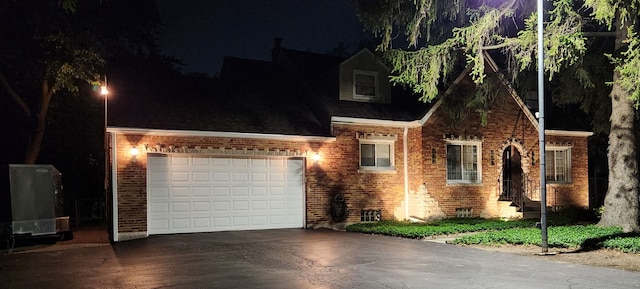 5400 Midlothian Tpke, Crestwood, IL 60418 - view of front of house with brick siding, driveway, and a garage