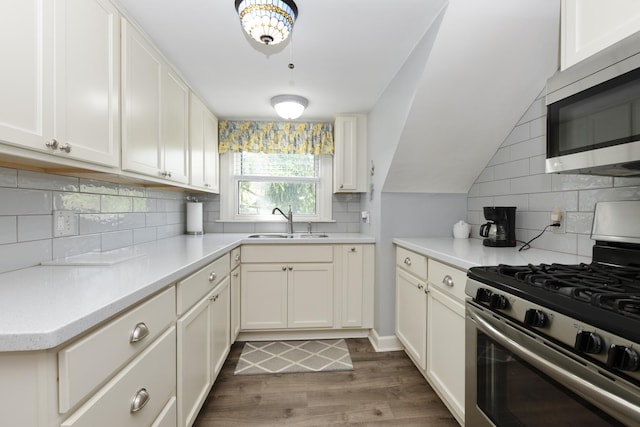 5400 Midlothian Tpke, Crestwood, IL 60418 - kitchen with appliances with stainless steel finishes, a sink, tasteful backsplash, light wood-type flooring, and light countertops