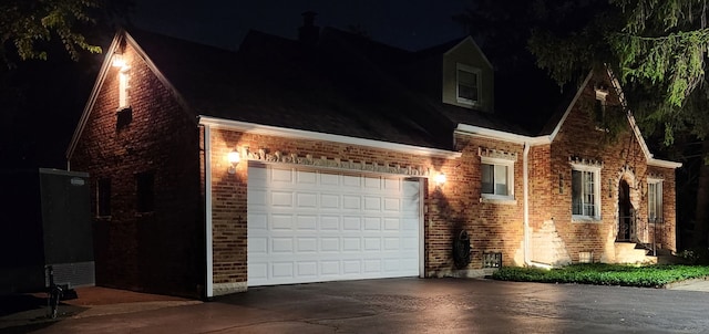 5400 Midlothian Tpke, Crestwood, IL 60418 - garage at night with concrete driveway