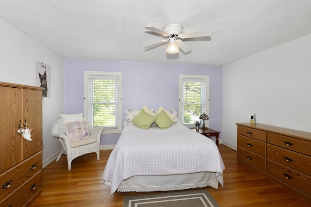5400 Midlothian Tpke, Crestwood, IL 60418 - bedroom with multiple windows, light wood-style floors, baseboards, and a textured ceiling