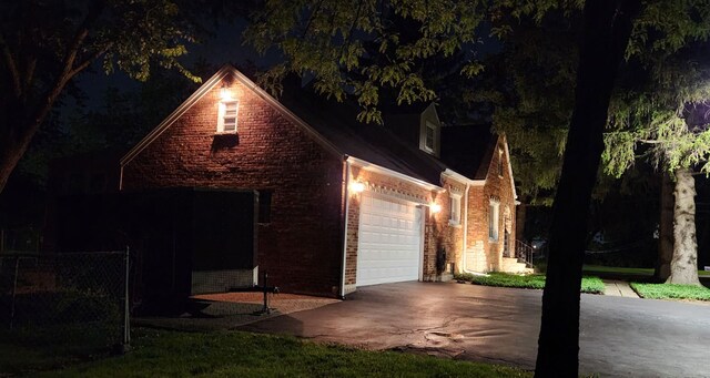 5400 Midlothian Tpke, Crestwood, IL 60418 - view of front of home with driveway, brick siding, and an attached garage