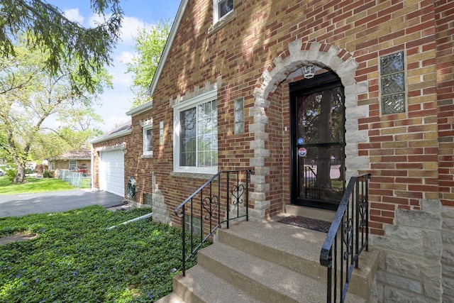 5400 Midlothian Tpke, Crestwood, IL 60418 - doorway to property with brick siding, a garage, and asphalt driveway