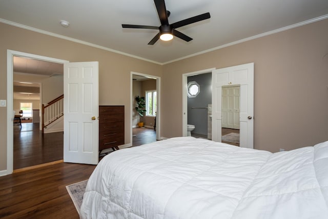 2112 Church St, Johnsburg, IL 60051 - bedroom with multiple windows, dark wood-type flooring, crown molding, ensuite bathroom, and baseboards