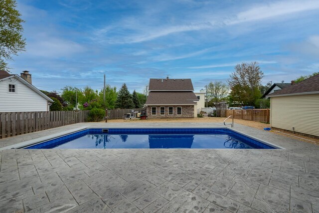 2112 Church St, Johnsburg, IL 60051 - view of swimming pool with a patio and a fenced backyard