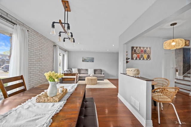 8327 S 78th Ave, Bridgeview, IL 60455 - dining space with wood finished floors, baseboards, and a chandelier