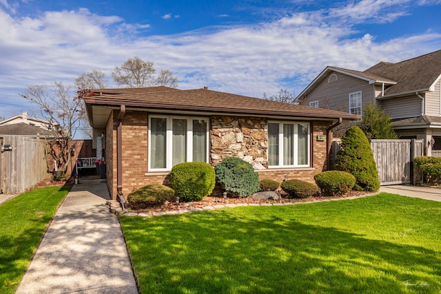 8327 S 78th Ave, Bridgeview, IL 60455 - bungalow featuring brick siding and a gate
