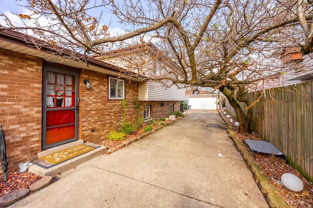 8327 S 78th Ave, Bridgeview, IL 60455 - view of home's exterior featuring brick siding, fence, a garage, and an outdoor structure