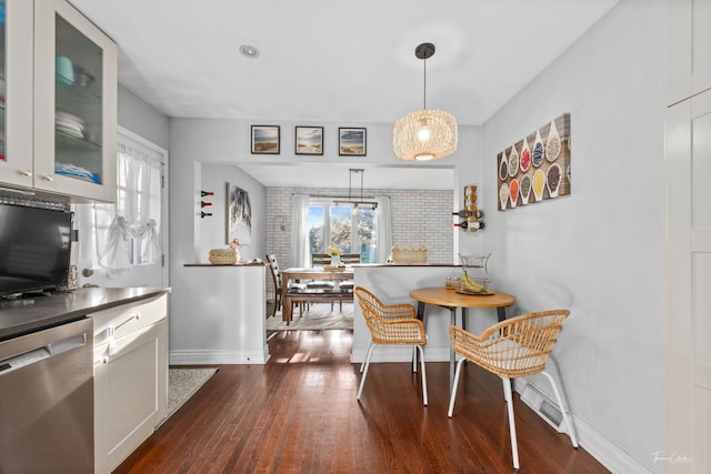 8327 S 78th Ave, Bridgeview, IL 60455 - dining space with dark wood-style flooring and baseboards