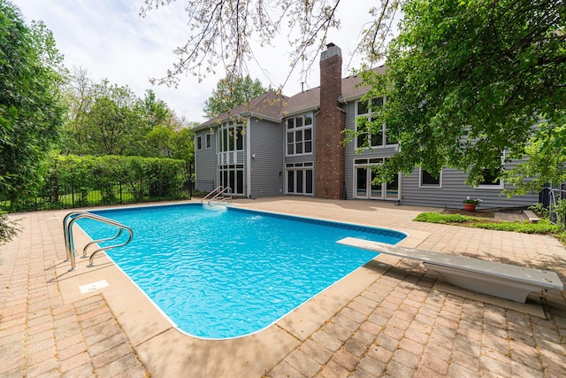 3302 Greenwood Ln, Saint Charles, IL 60175 - view of pool with a patio area and a diving board