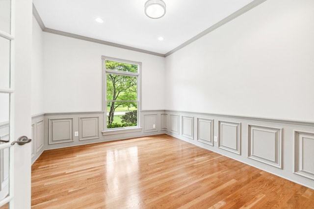 3302 Greenwood Ln, Saint Charles, IL 60175 - spare room featuring crown molding, wainscoting, wood finished floors, a decorative wall, and recessed lighting