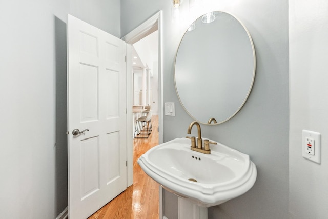 3302 Greenwood Ln, Saint Charles, IL 60175 - bathroom featuring wood finished floors and a sink