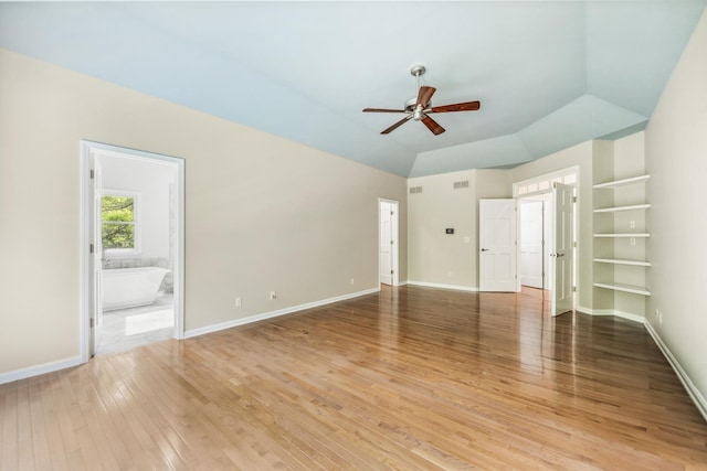 3302 Greenwood Ln, Saint Charles, IL 60175 - unfurnished bedroom with light wood-type flooring, baseboards, ensuite bath, and vaulted ceiling