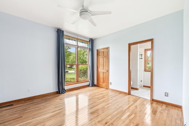 3302 Greenwood Ln, Saint Charles, IL 60175 - empty room with light wood-style flooring, baseboards, and ceiling fan