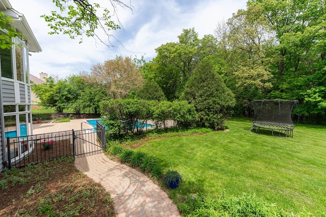 3302 Greenwood Ln, Saint Charles, IL 60175 - view of yard featuring a trampoline and a patio area
