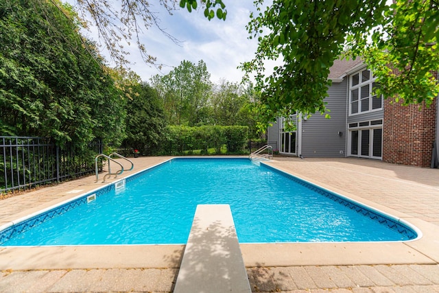 3302 Greenwood Ln, Saint Charles, IL 60175 - view of swimming pool featuring a patio area and a diving board