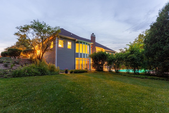 3302 Greenwood Ln, Saint Charles, IL 60175 - rear view of house with a chimney