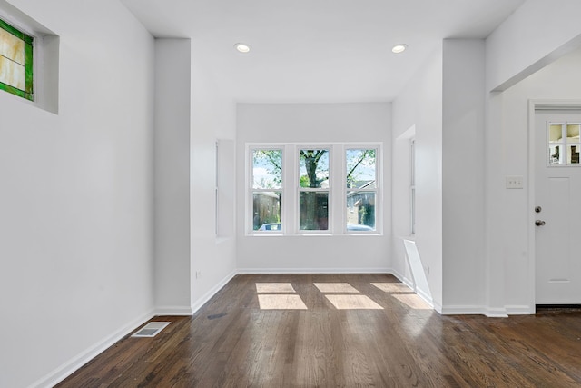 7709 S Eberhart Ave, Chicago, IL 60619 - foyer with dark wood-style floors, recessed lighting, and baseboards