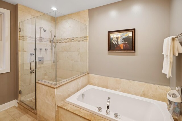 1242 W Jackson Blvd Unit 2W, Chicago, IL 60607 - bathroom with a garden tub, a shower stall, and recessed lighting