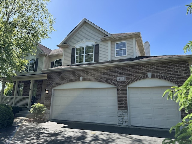 13464 Skyline Dr, Plainfield, IL 60585 - view of front of property featuring a garage and brick siding