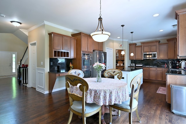 13464 Skyline Dr, Plainfield, IL 60585 - dining space featuring dark wood-style flooring, recessed lighting, and crown molding