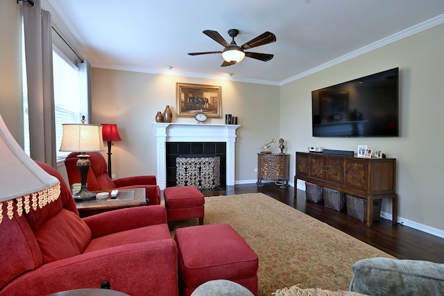 13464 Skyline Dr, Plainfield, IL 60585 - living room with ceiling fan, crown molding, baseboards, a tile fireplace, and wood finished floors