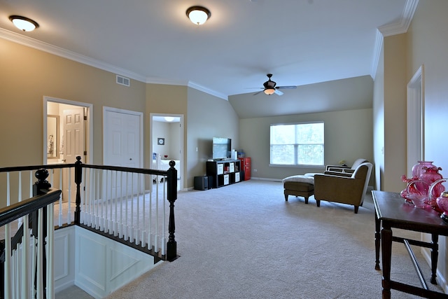 13464 Skyline Dr, Plainfield, IL 60585 - living area with ceiling fan, crown molding, carpet, baseboards, and vaulted ceiling