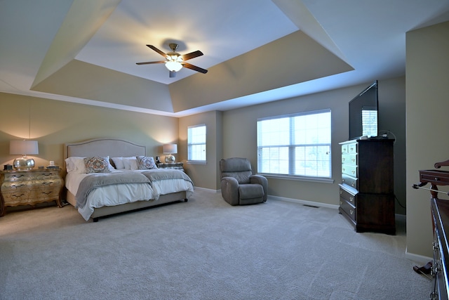 13464 Skyline Dr, Plainfield, IL 60585 - bedroom featuring a raised ceiling, carpet flooring, a ceiling fan, and baseboards