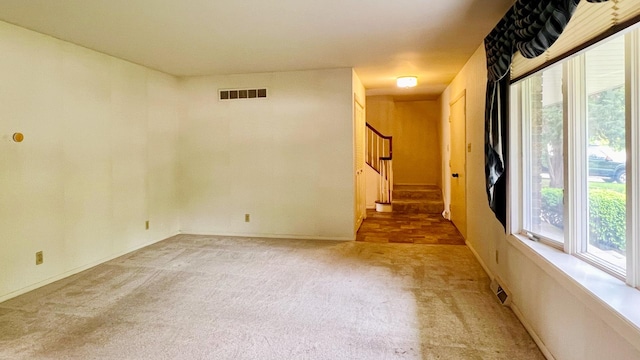 1305 Baugh Dr, Normal, IL 61761 - carpeted empty room with stairs