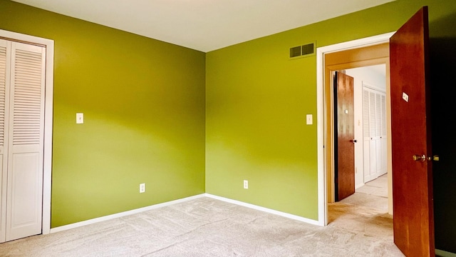1305 Baugh Dr, Normal, IL 61761 - unfurnished bedroom with carpet flooring and baseboards