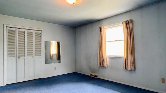 1305 Baugh Dr, Normal, IL 61761 - unfurnished bedroom featuring carpet floors and a closet