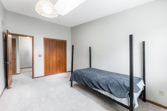 1868 Kerrybrook Ct Unit 1868, Sycamore, IL 60178 - bedroom with light colored carpet, baseboards, a closet, and a skylight