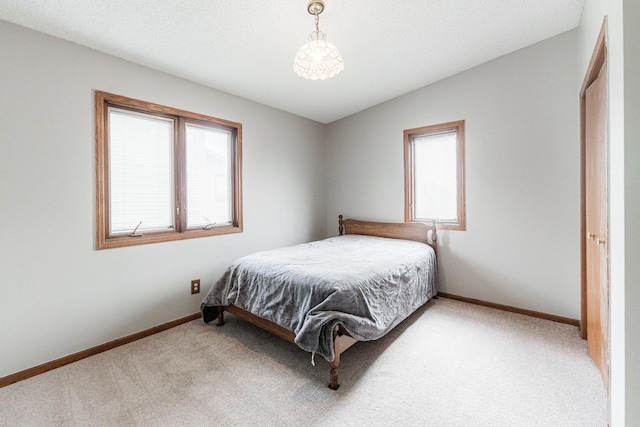 1868 Kerrybrook Ct Unit 1868, Sycamore, IL 60178 - bedroom featuring baseboards and light carpet
